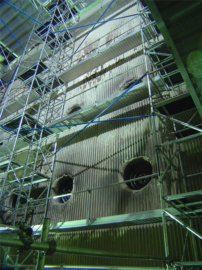 Boiler scaffolding up the inside walls of a boiler