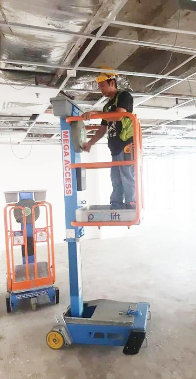 Mega Pecolift in use under a ceiling