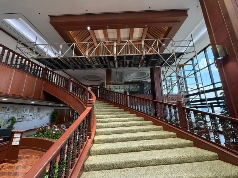 Truss bridge over a grand staircase at AmBank