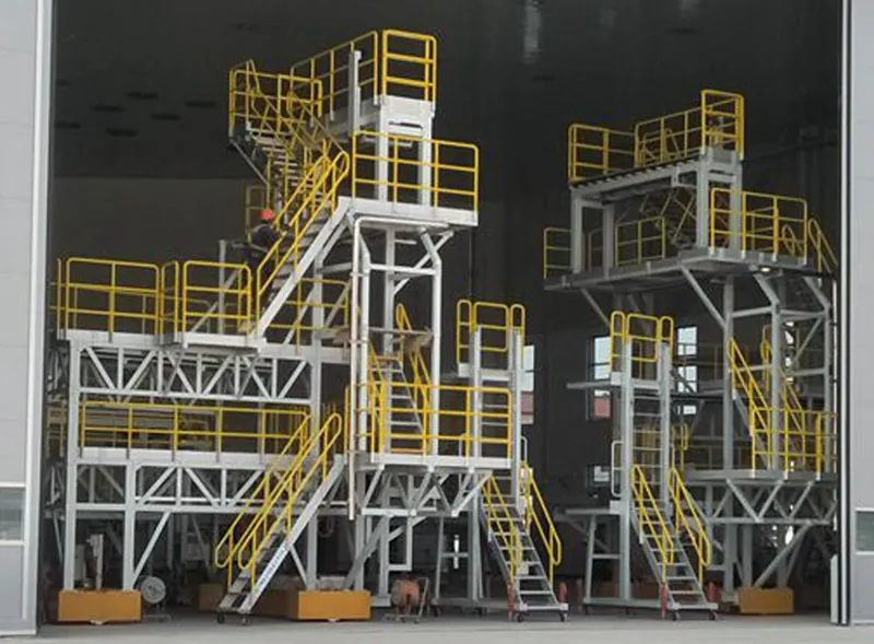 Tail dock towers in a hangar