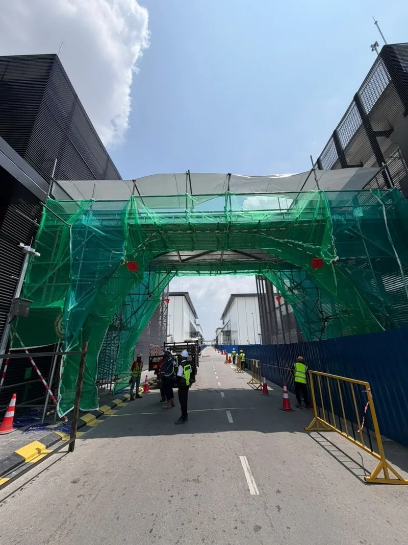 Netted tubular gantry over a road in Nusajaya